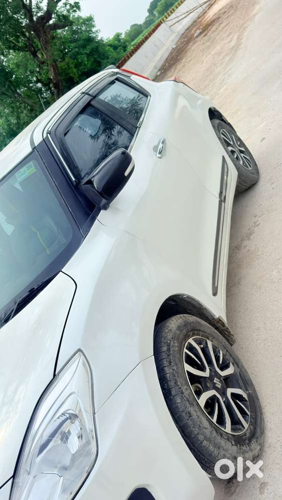 Swift Vxi 2021 Km Driven