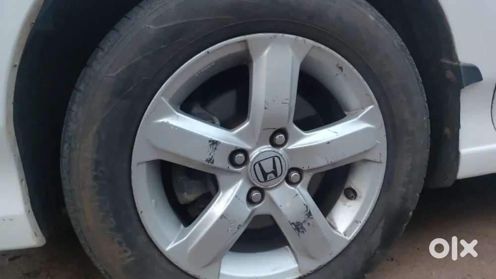 Honda City With Alloy Wheels.perfect Sterios.petrol With Cng.