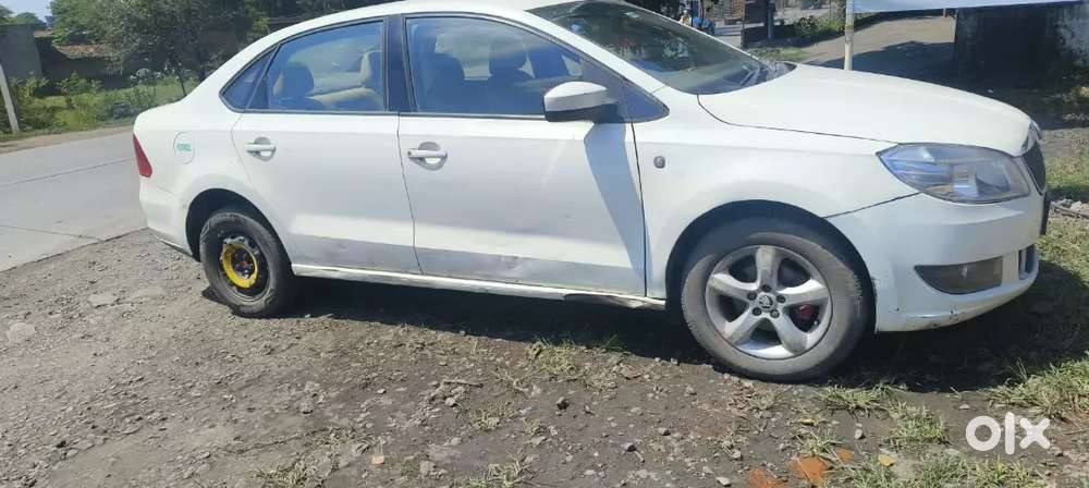 Skoda Rapid Elegance Petrol Manual 2014