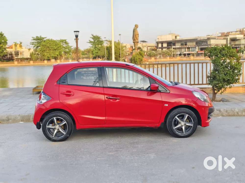 Honda Brio Sporty Look 
 Magwiil Spot Tire Center Lock