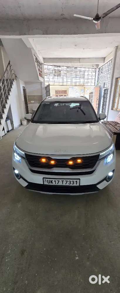 2023 Kia Seltos Htk Plus Imt Petrol  White  45,000 Km  Single Owner
