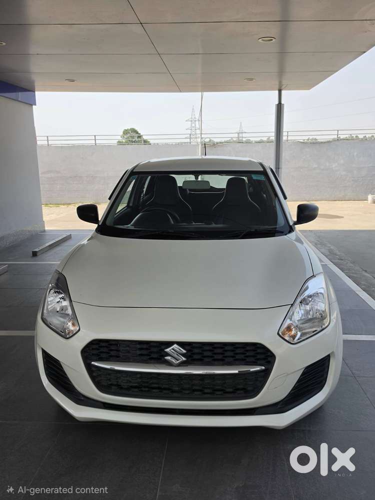 Maruti Suzuki Swift 1.2 Lxi (o), 2024, Petrol