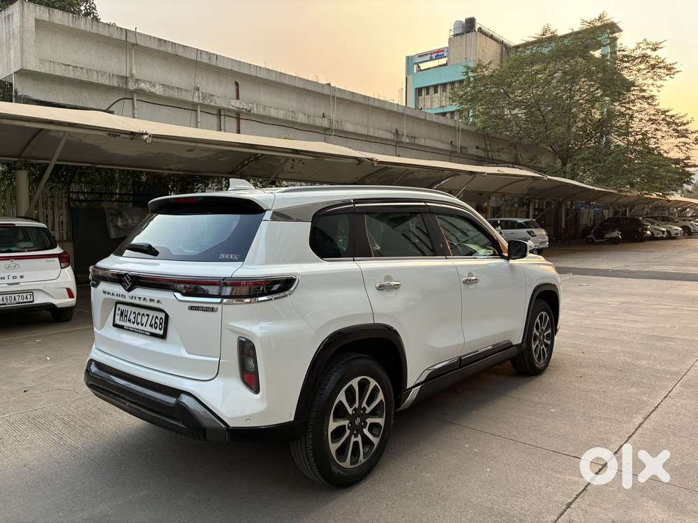 Maruti Suzuki Grand Vitara 1.5 Zeta Plus Dual Tone Intelligent Hybri..