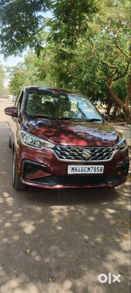 Ertiga Smart Hybrid Vxi (o) , Colour -prme. Auburn Red