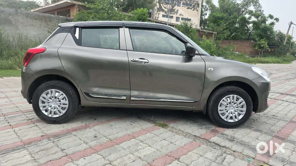 Maruti Suzuki Swift 1.2 Lxi (o), 2023, Petrol
