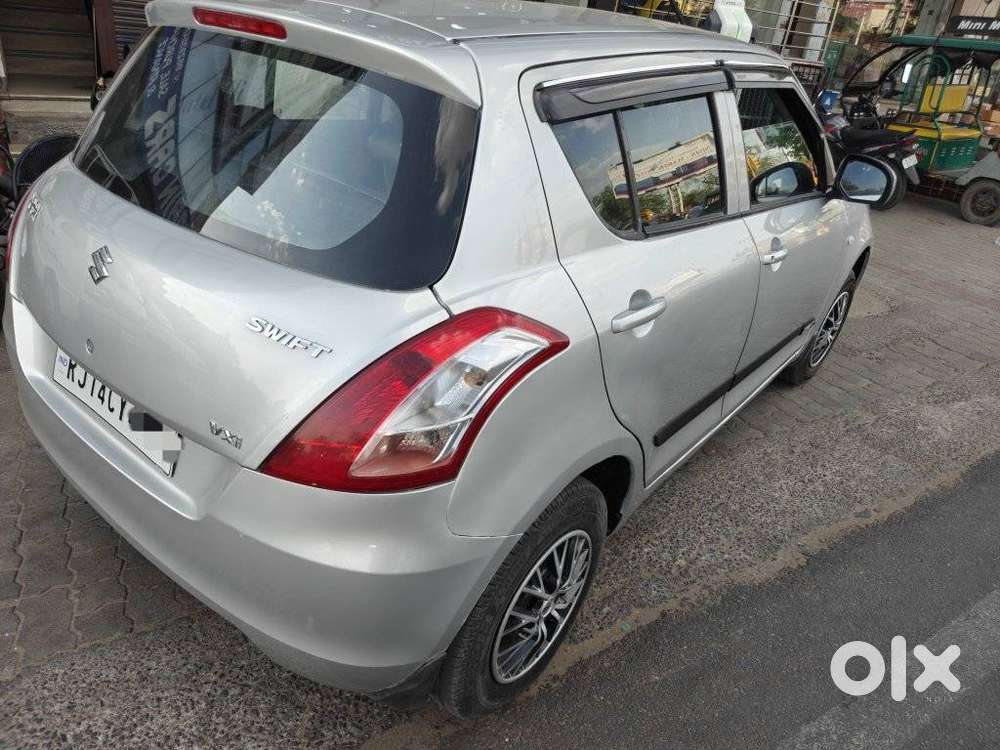 Maruti Suzuki Swift Lxi Optional-o, 2015, Petrol