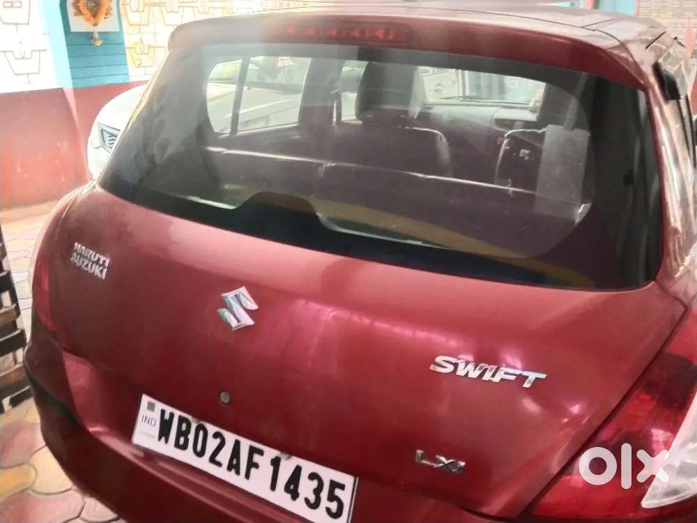 Maruti Suzuki Swift Lxi 2014