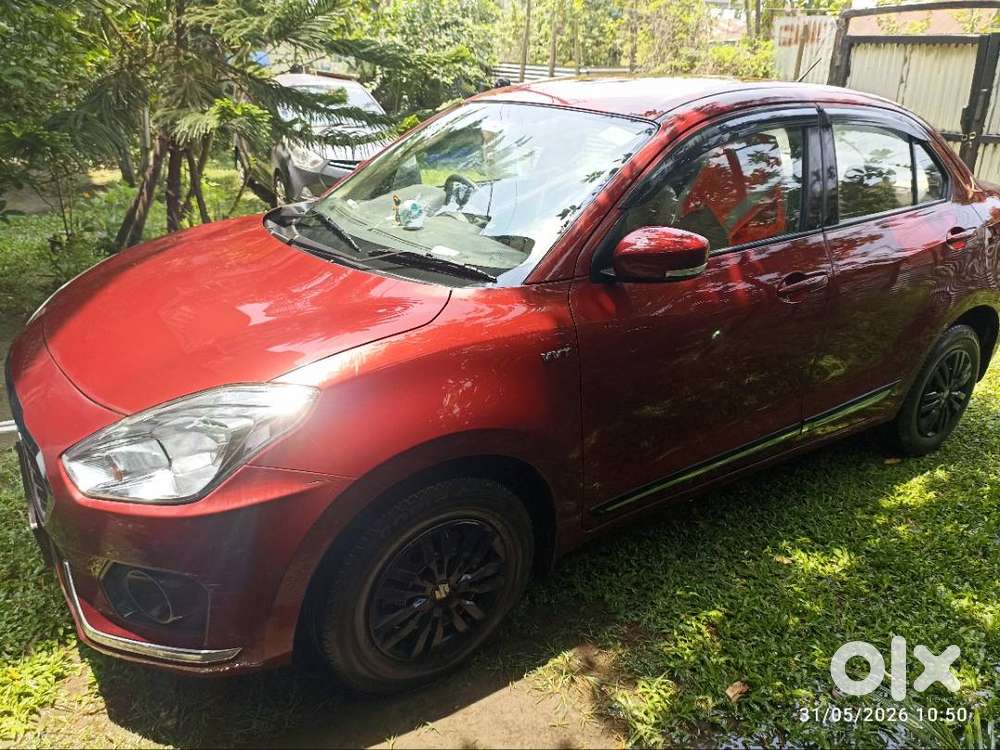 Maruti Suzuki Dzire ( Gallant Red). First Owner