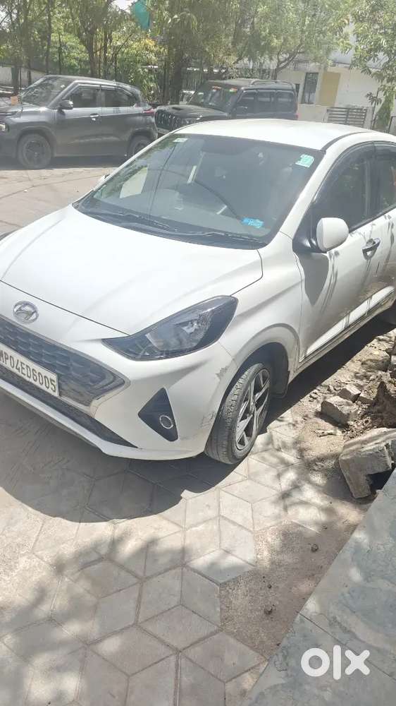 Hyundai Aura 2022 Petrol 41000 Km  Services Centre ,armrest,sunshades
