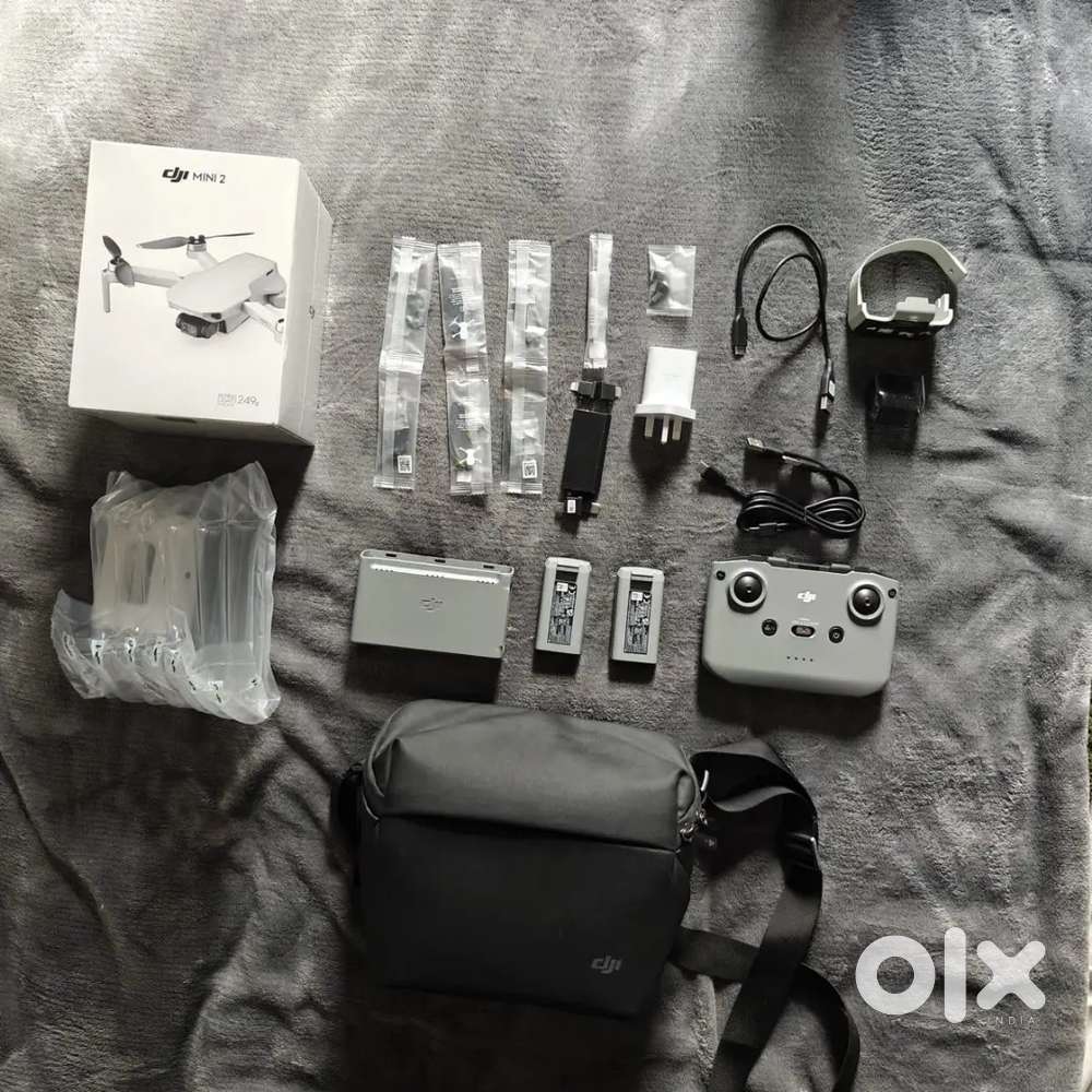 DJI Mini 2 Drone with Fly more kit + Carry Bag - sealed.