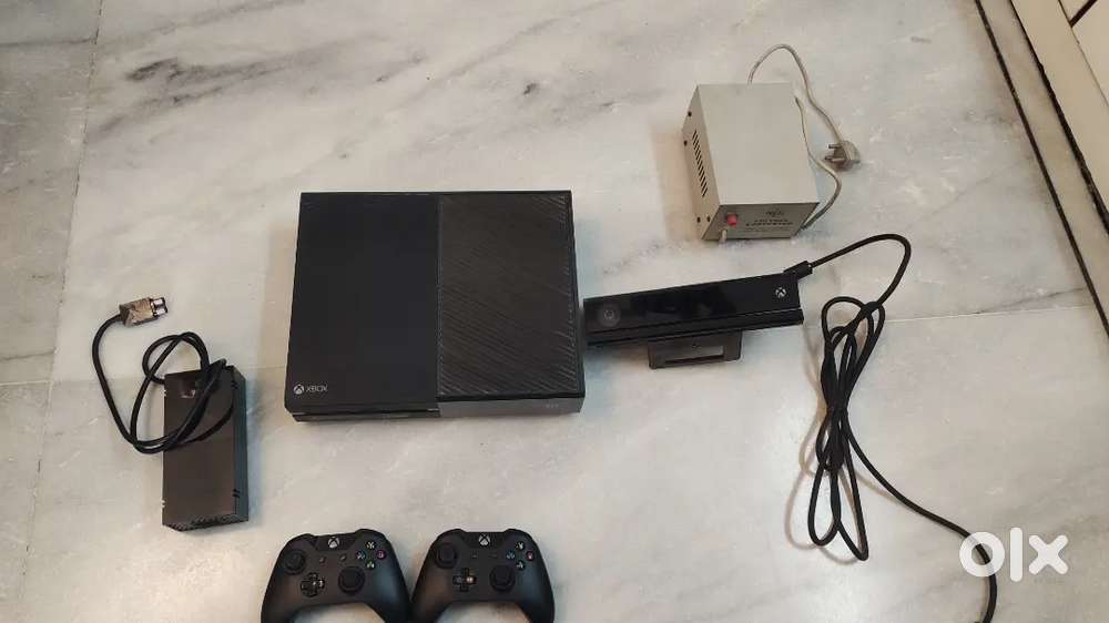 Xbox one console with 2 controllers,adapter,cables,kinet,voltage conve