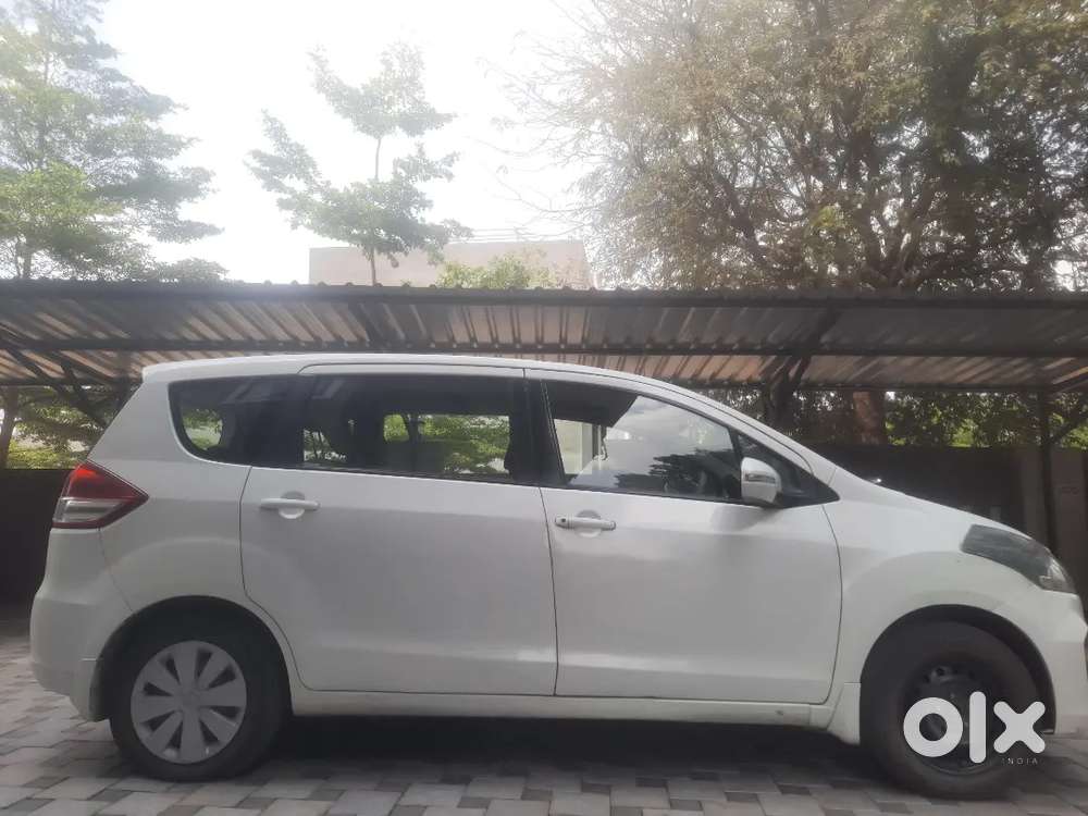 White Ertiga, Brand New Spare Tire, Only 1 Year Old Battery.