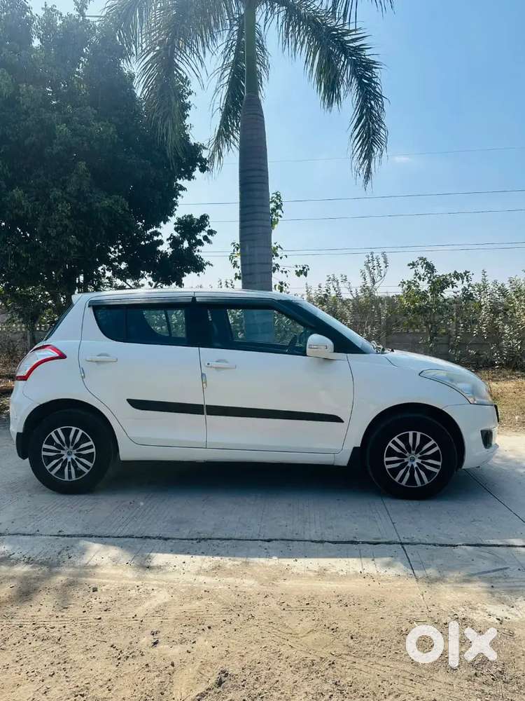 Maruti Suzuki Swift Lxi 2013