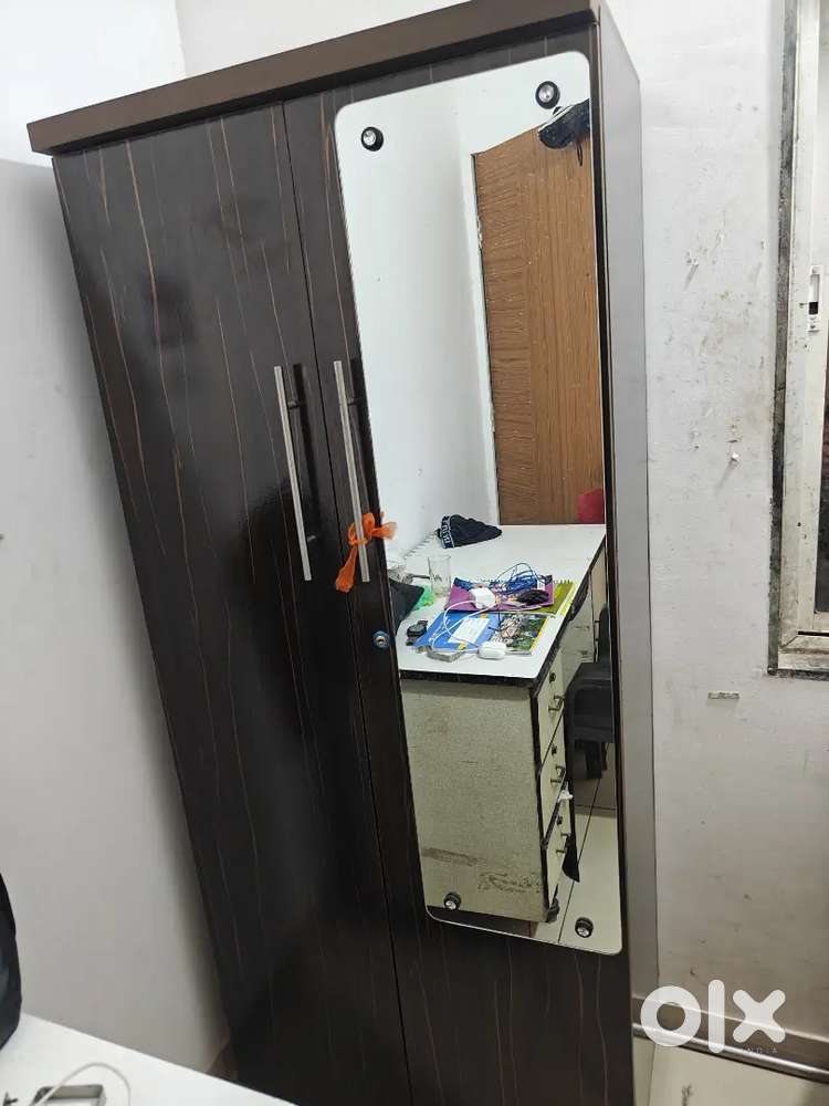 Cupboard __ (6000)and bed with mattress (3500)