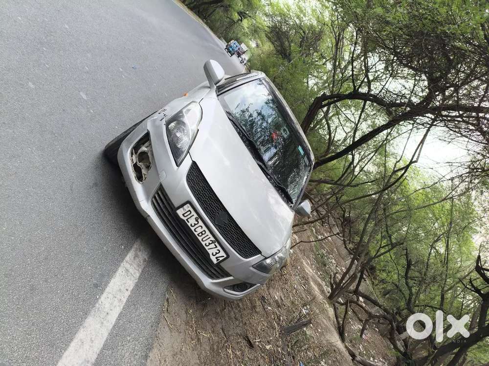 Maruti Suzuki Swift Lxi 2012