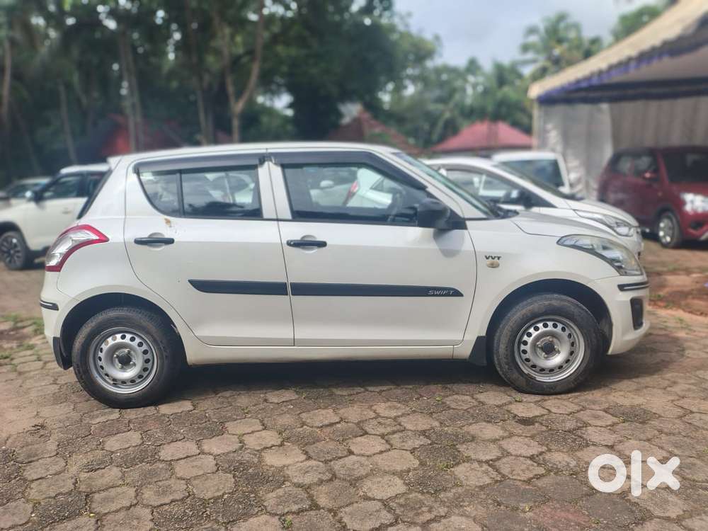 Maruti Suzuki Swift Lxi Option, 2016, Petrol