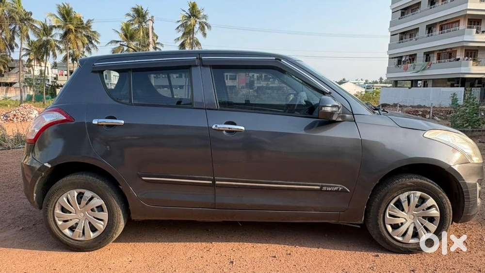Maruti Suzuki Swift 2016 Vxi Petrol , Dark Grey ,well