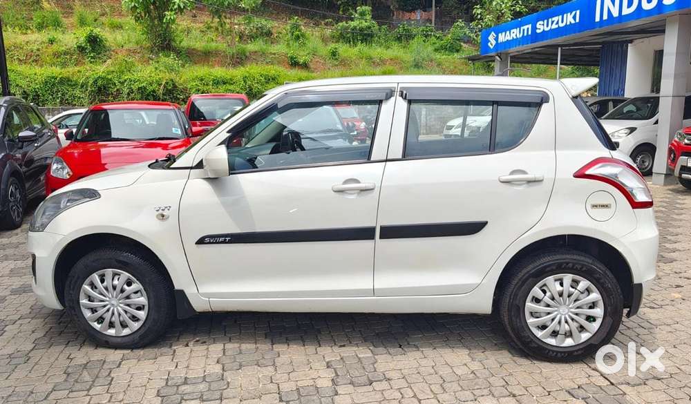 Maruti Suzuki Swift Lxi Optional-o, 2015, Petrol