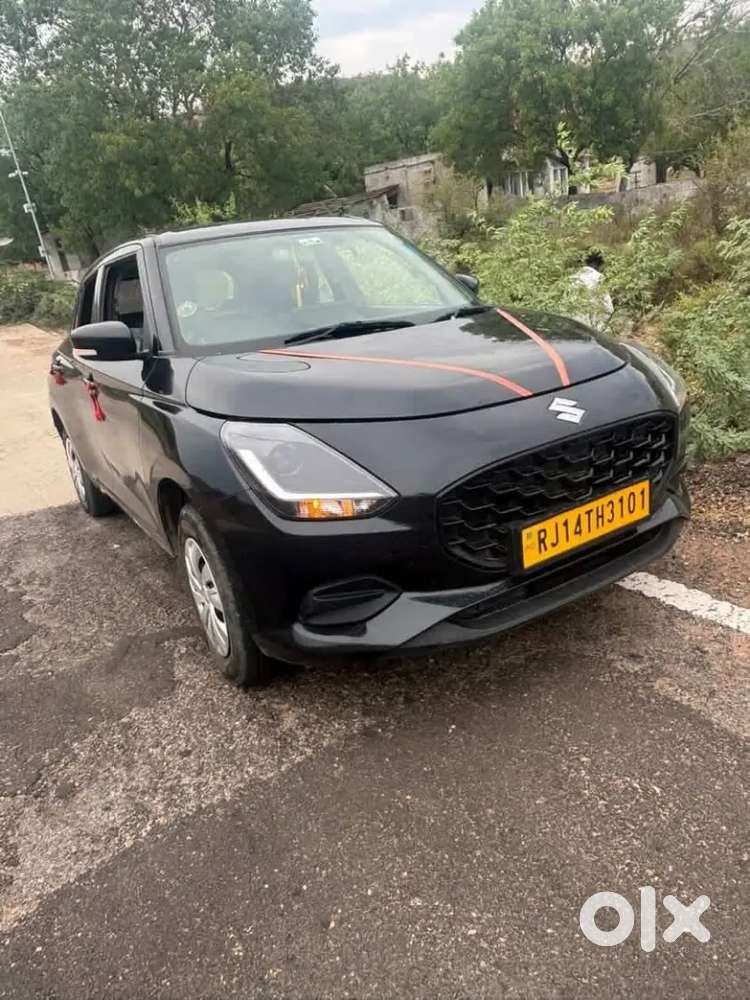 Maruti Suzuki Swift Vxi 2026