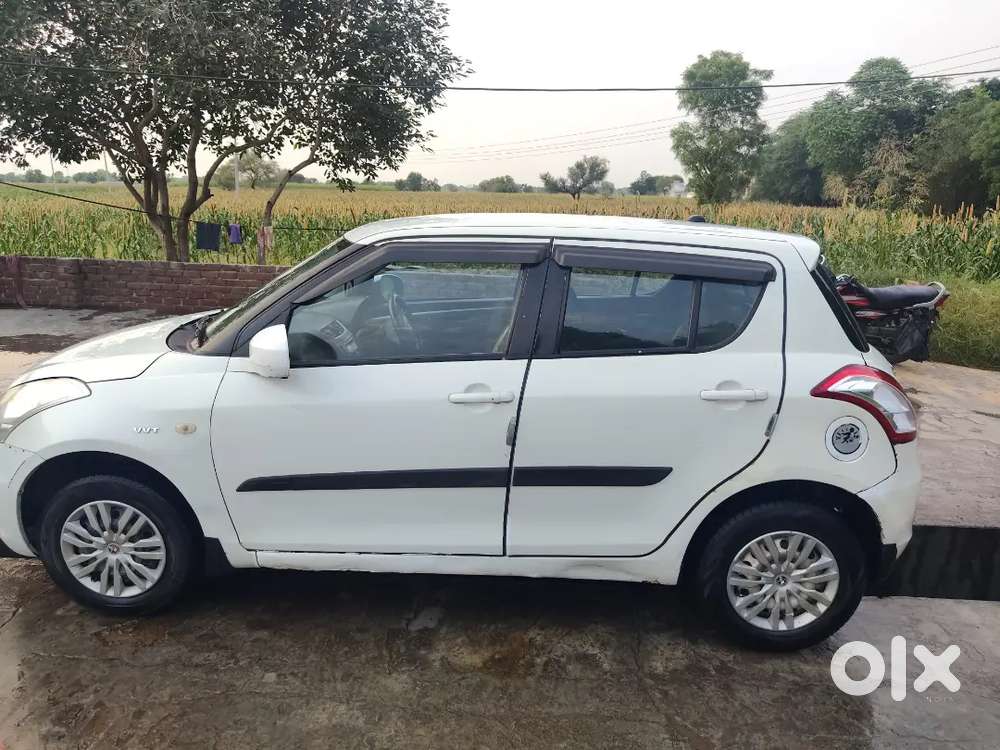 Maruti Suzuki Swift Lxi 2016