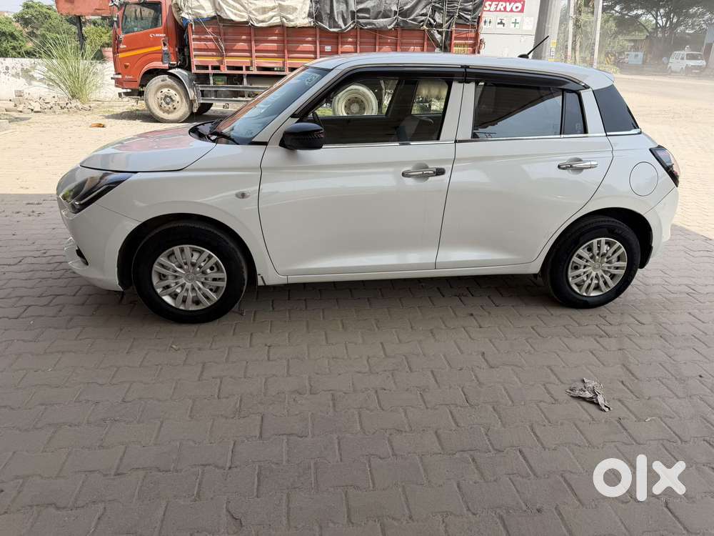 Maruti Suzuki Swift Lxi Optional-o, 2024, Petrol