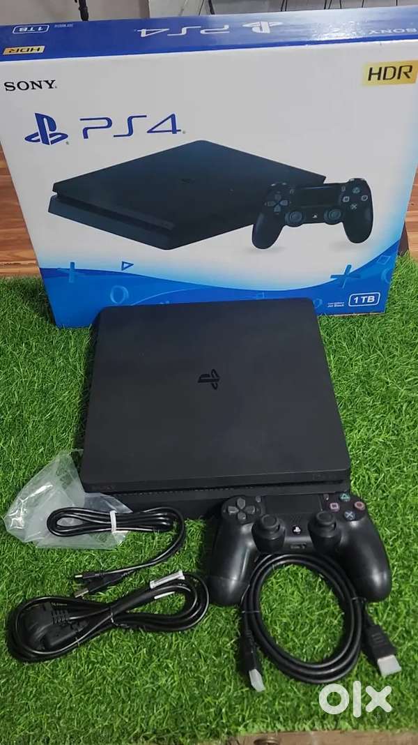 Ps4 slim 1tb with 15games 1 year warranty