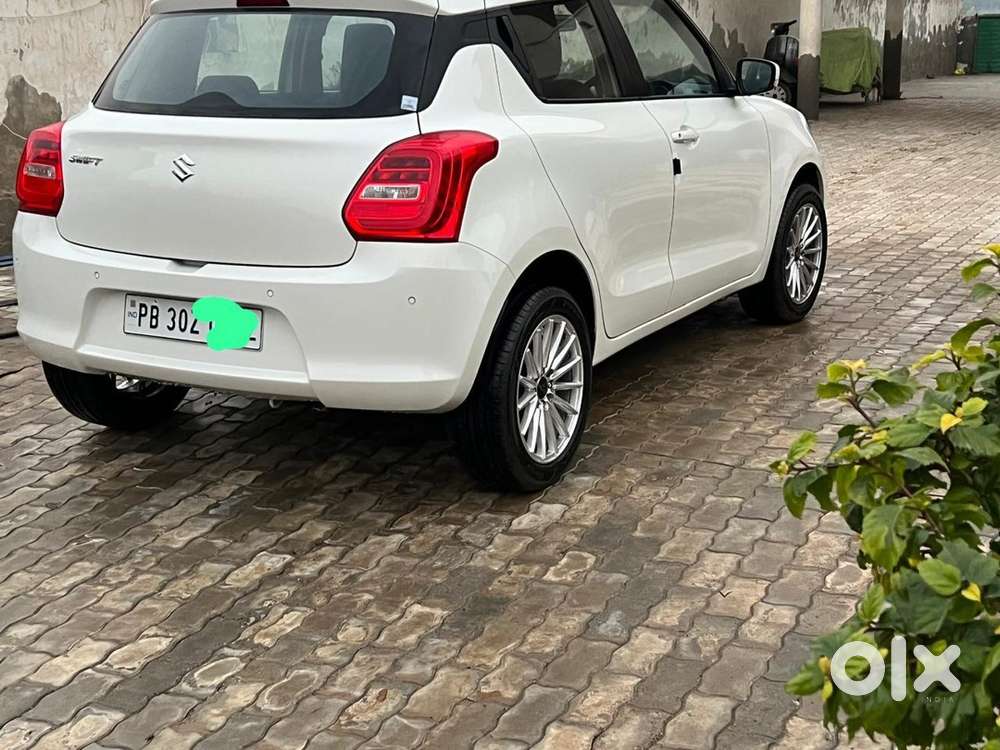  Maruti Suzuki Swift Vxi 2022  Pearl White  First Owner