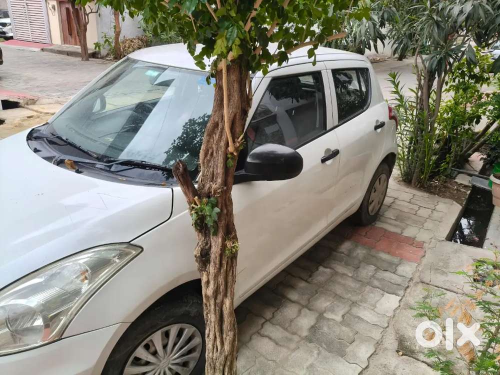 Maruti Suzuki Swift 2014 Petrol 89000 Km Single Hand Driven Pearl Whit