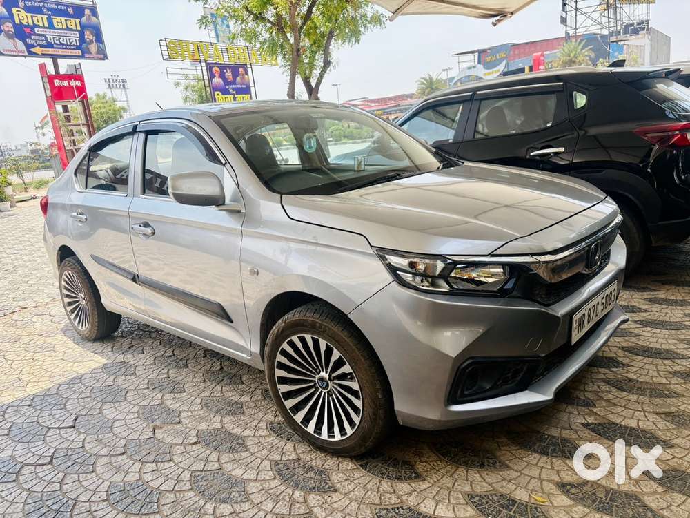 Honda Amaze Petrol/cng  2019  64000 K.m Driven  Hr 87 Reg.