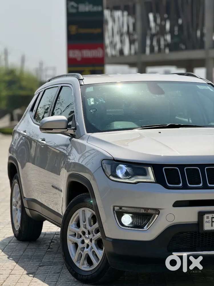 Jeep Compass 4x4 Next To Showroom