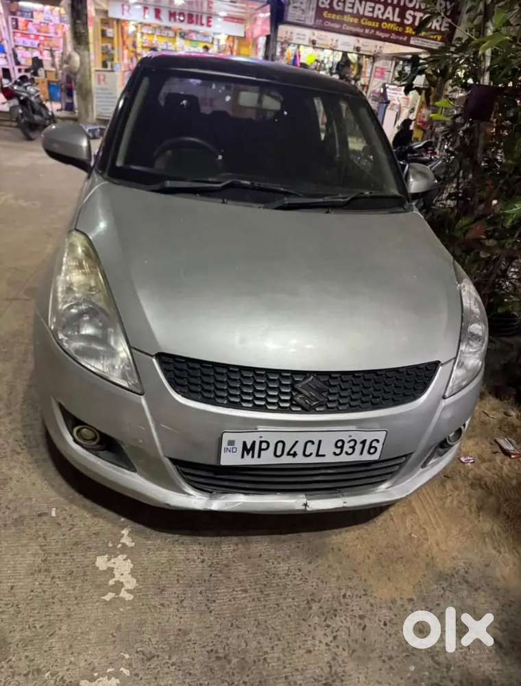 Maruti Suzuki Swift Lxi 2013