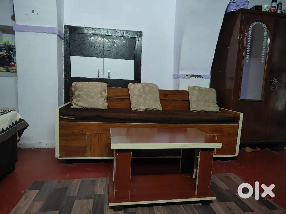Sofa for sale with storage box,pillows and with coffe/tea table