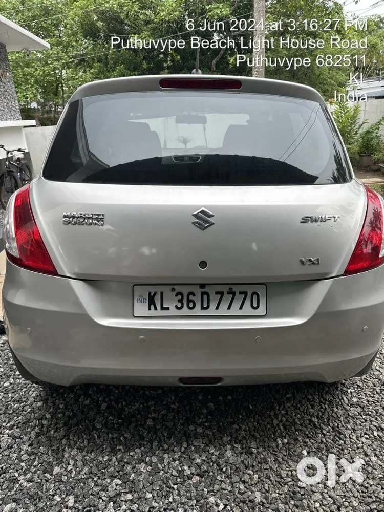 Maruti Suzuki Swift Lxi 2014