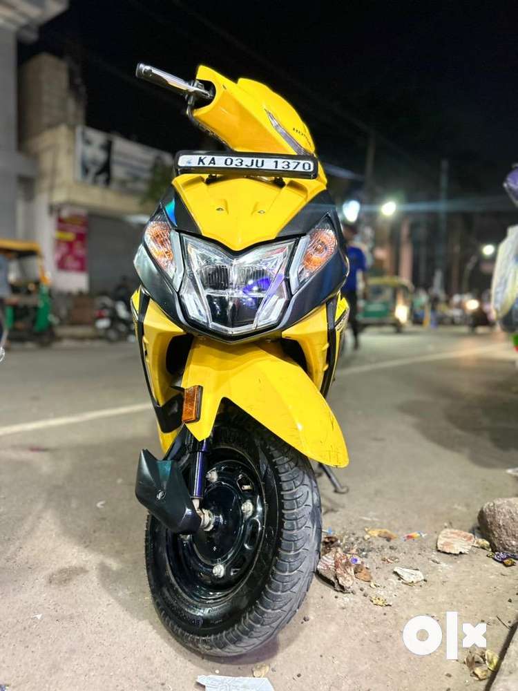 Dio scooty yellow discount colour