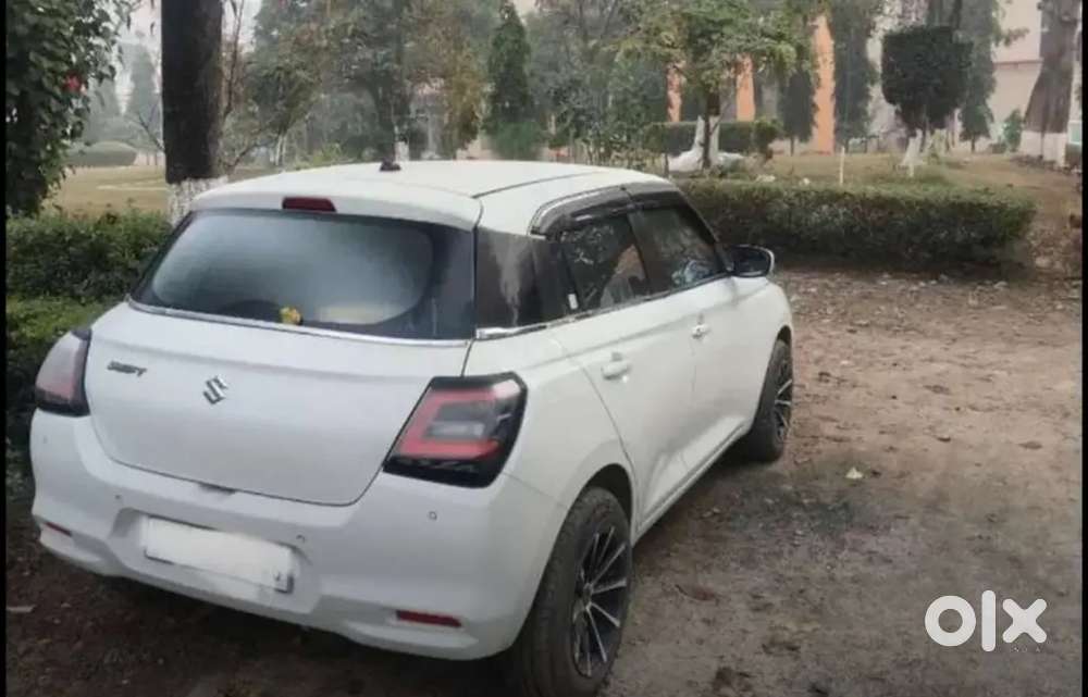 New Gen White Swift In Showroom Condition.