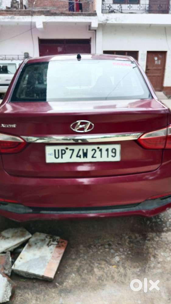 Xcent Maroon Color