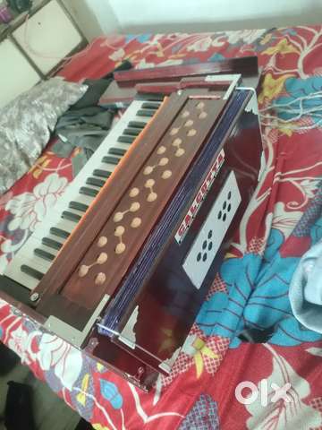 Olx old online harmonium