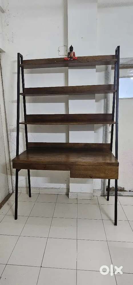 Sturdy shelf and rot iron dinning table