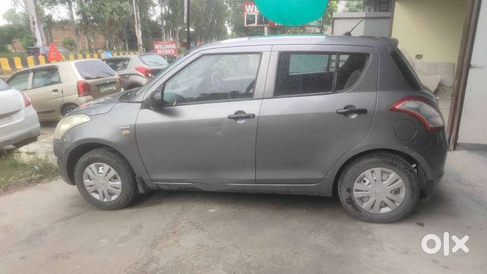 Maruti Suzuki Swift Lxi Optional-o, 2012, Petrol