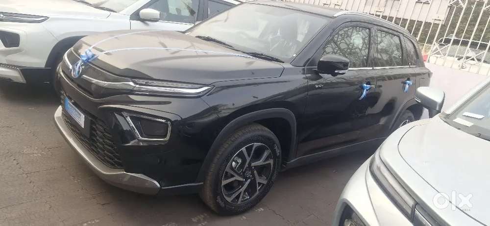 Toyota New Hyryder With Scooty Free In It.