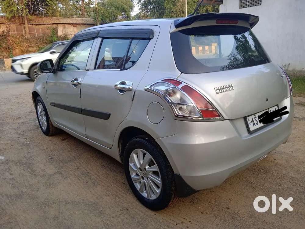Maruti Suzuki Swift Lxi 2011