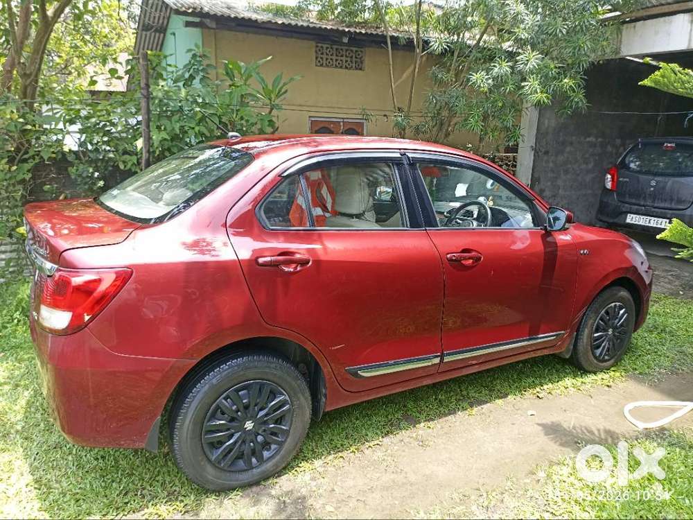 Maruti Suzuki Dzire ( Gallant Red). First Owner