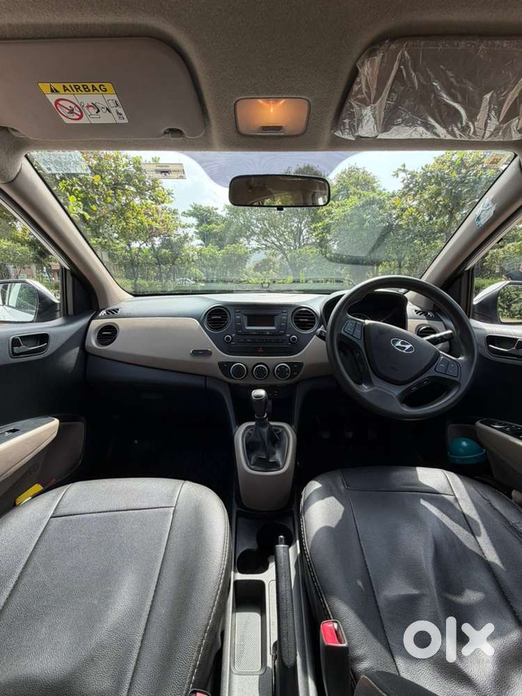 Hyundai Grand I10 Magna 1.2 Petrol  White  1st Owner  94,000 Kms