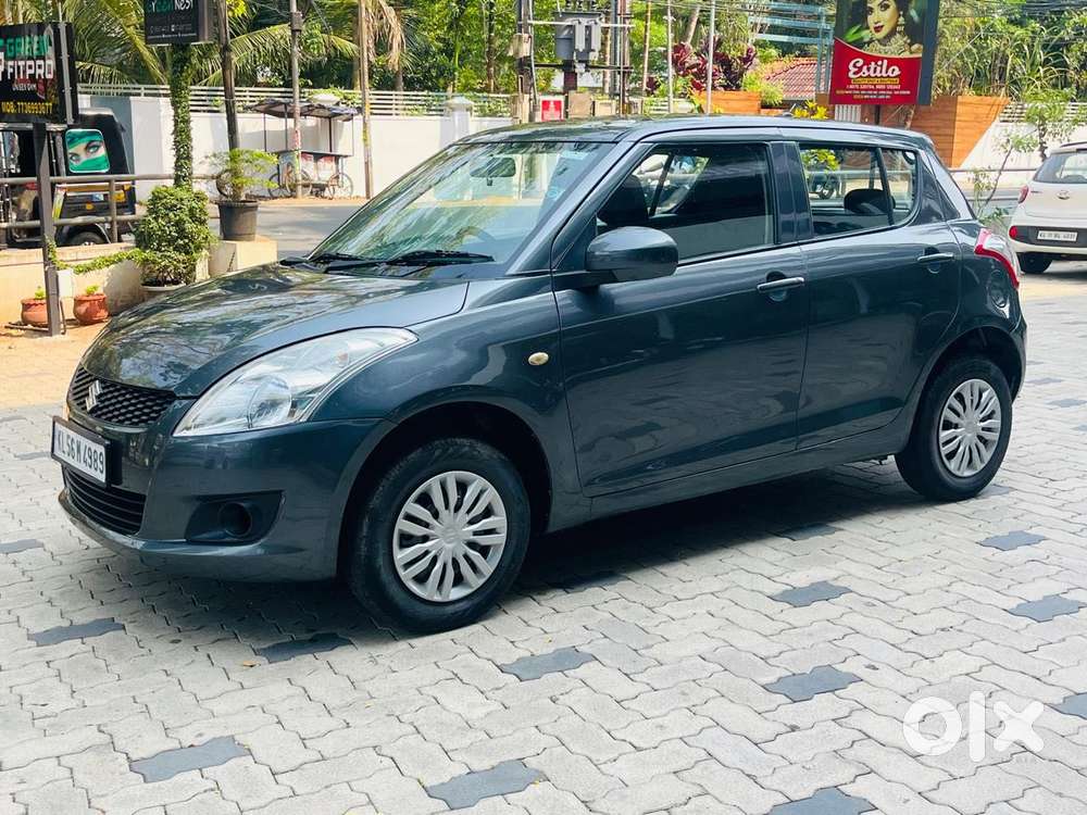 Maruti Suzuki Swift Lxi Optional-o, 2015, Petrol