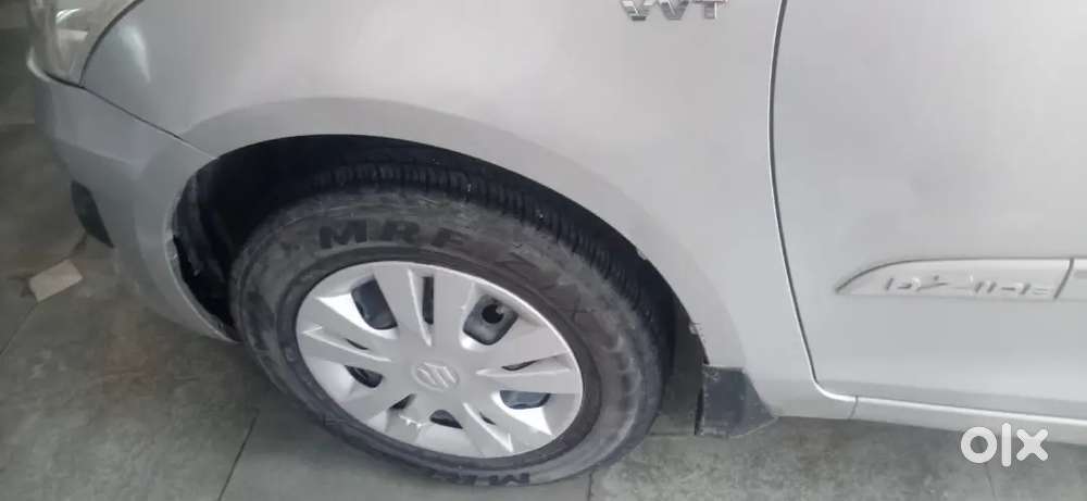 Maruti Suzuki Dzire 2014 Petrol Variant Cng Outside Fitted