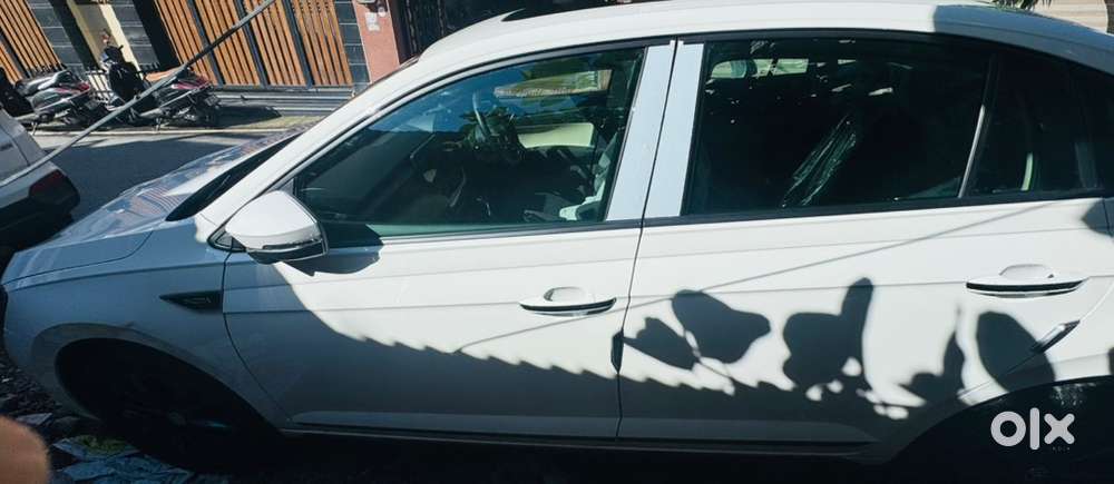 Skoda Slavia Sportsline A/t 1.0 Tsi  Candy White Colour