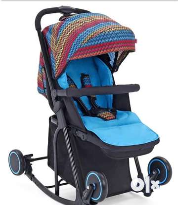 Babyhug stroller with rocker best sale