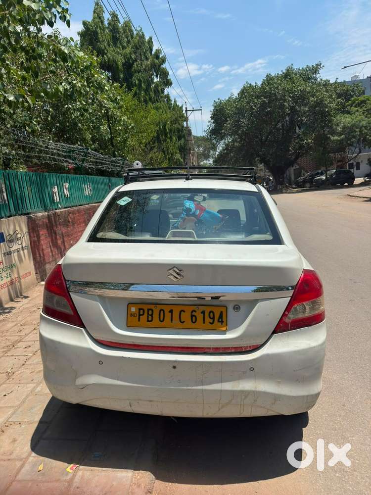 Dzire 1.2 Vxi 2021 Km Driven