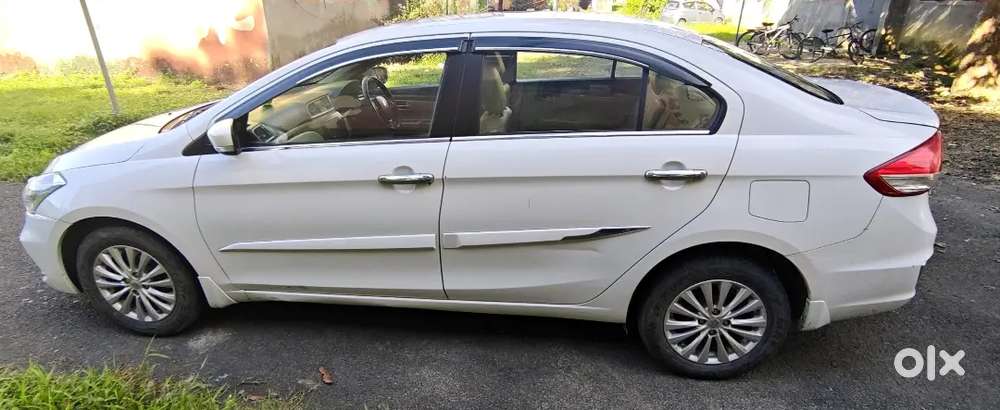 Well-maintained Ciaz Delta Hybrid White 35k Kms Alloy Wheels