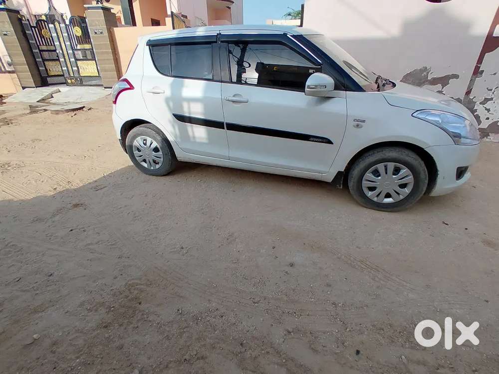 Maruti Suzuki Swift Lxi 2014